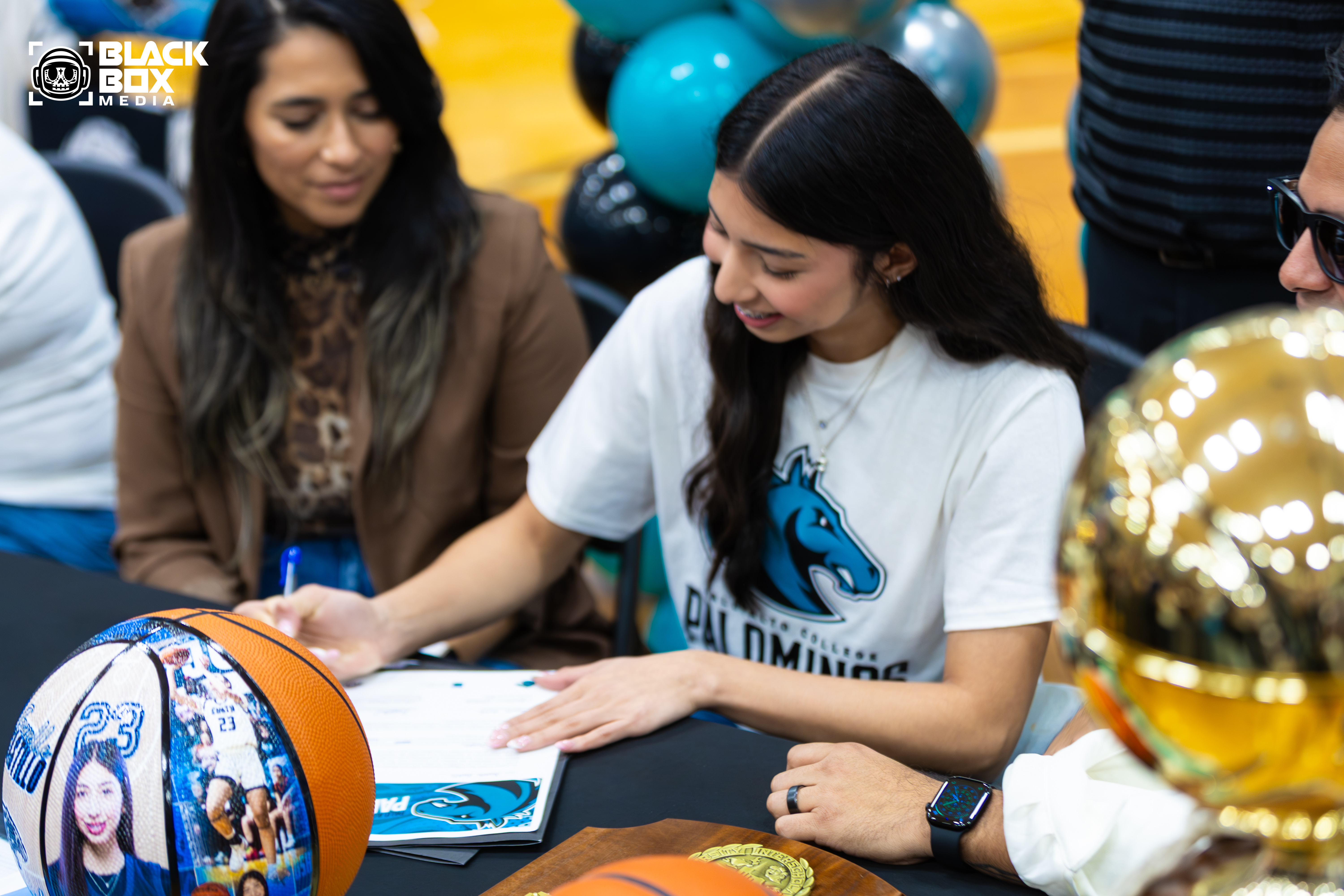 Jazzy at her college basketball signing